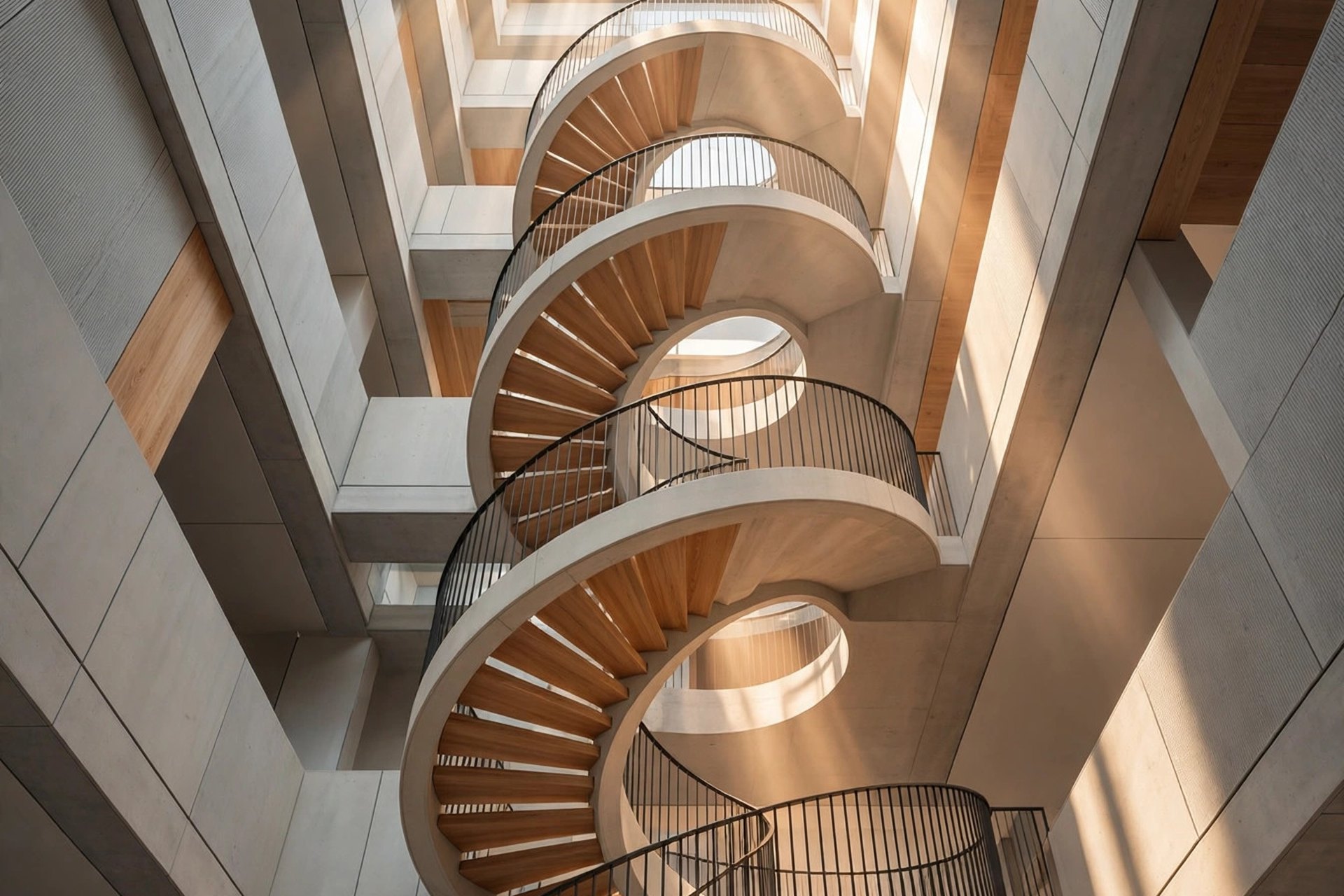 The five types of AI agents, from simplest to most advanced A spiral staircase viewed from below with light streaming from above, symbolizing the five levels of AI agent sophistication from simple reflex to learning agents
